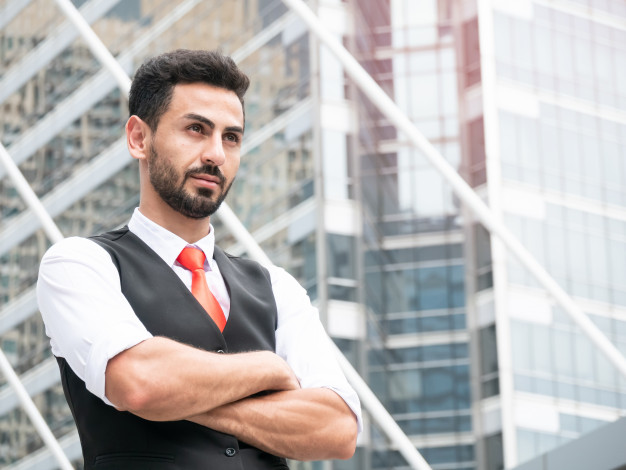 confident-arab-businessman-manager-standing-with-arms-crossed-outdoor-front-modern-office_3374...jpg